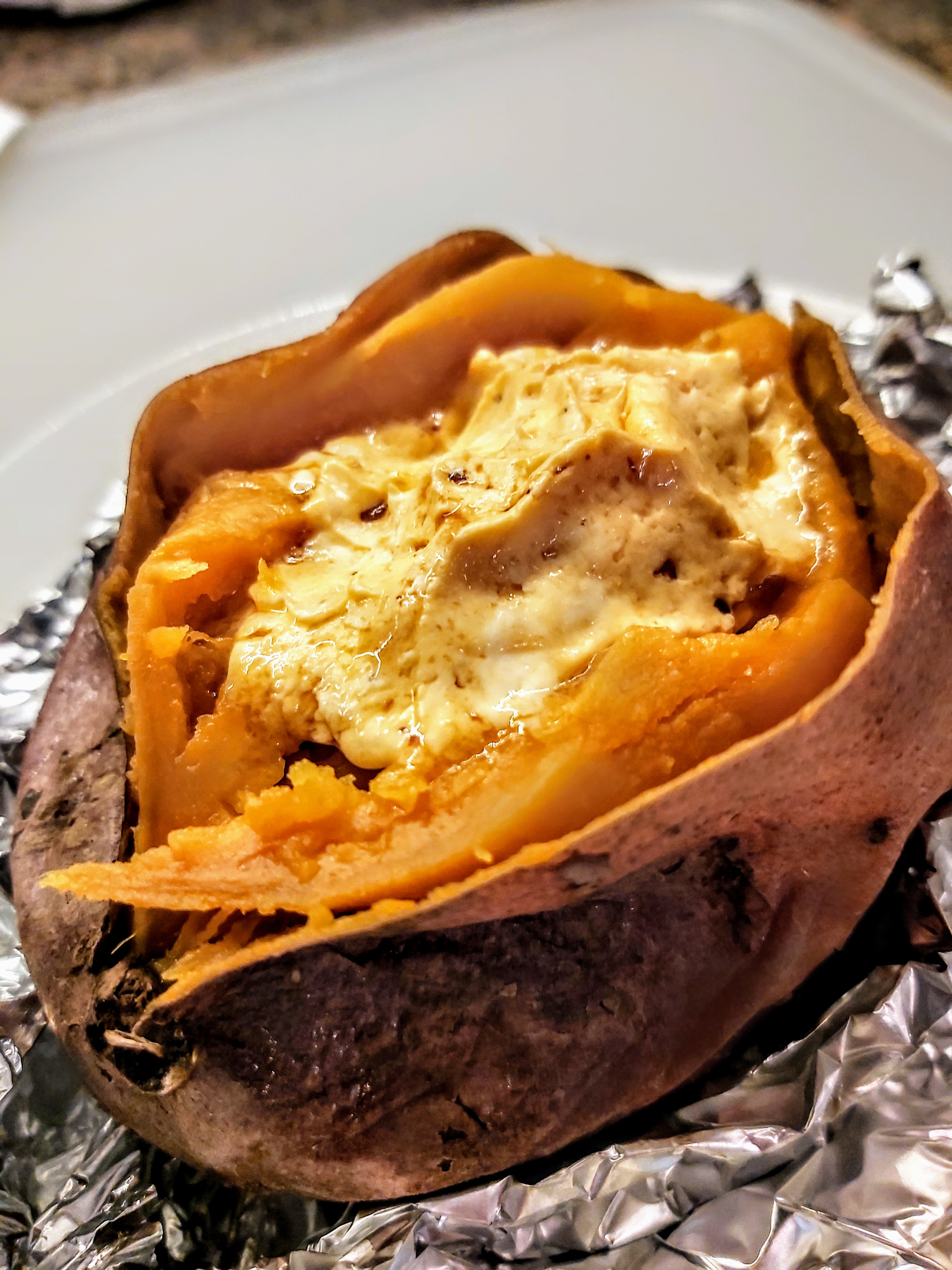 Baked Sweet Potatoes with Chipotle-Honey Butter