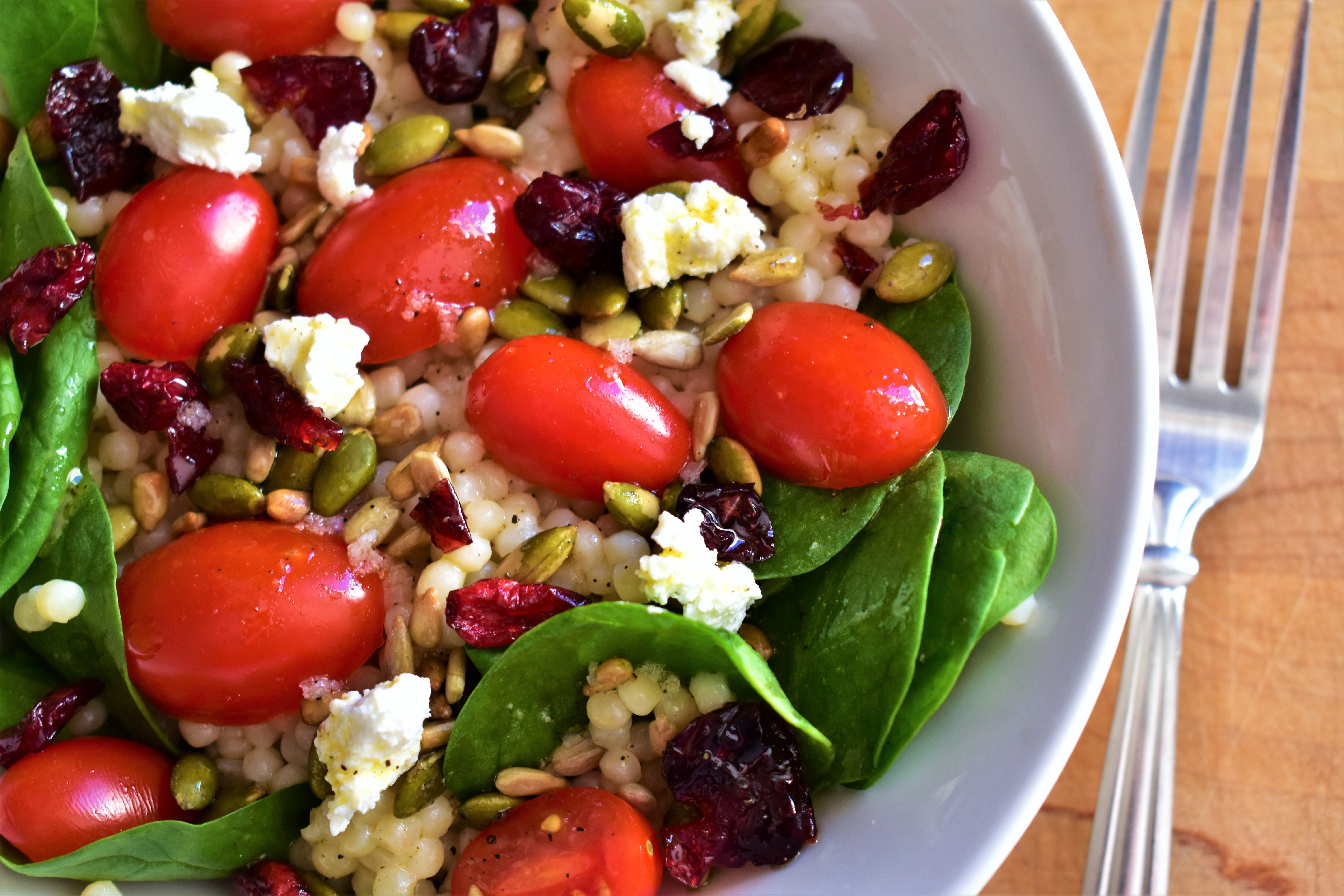 Couscous Salad with Kale, Tomatoes, Cranberries, and Feta