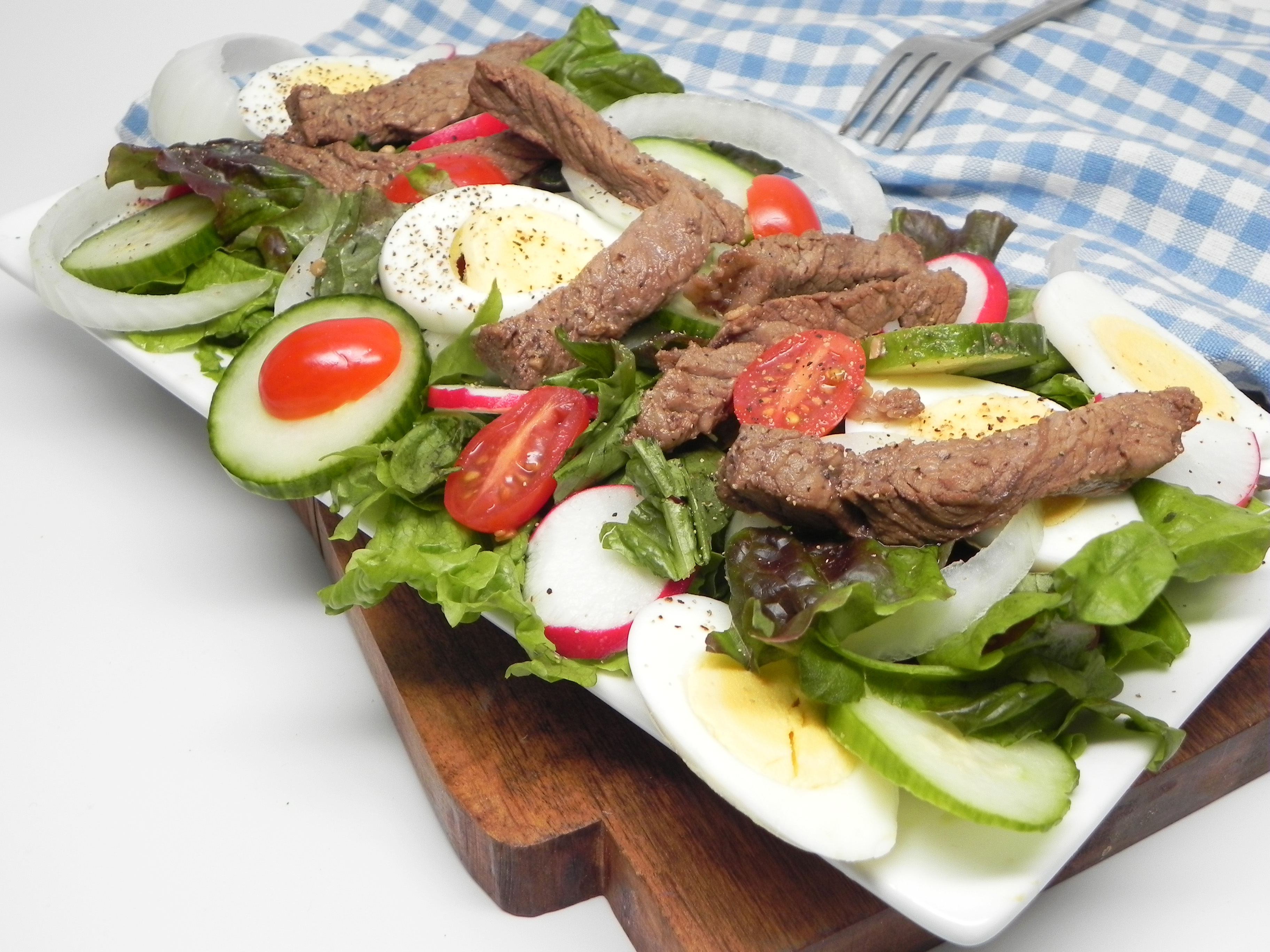 Layered Beef Salad with Warm Dressing