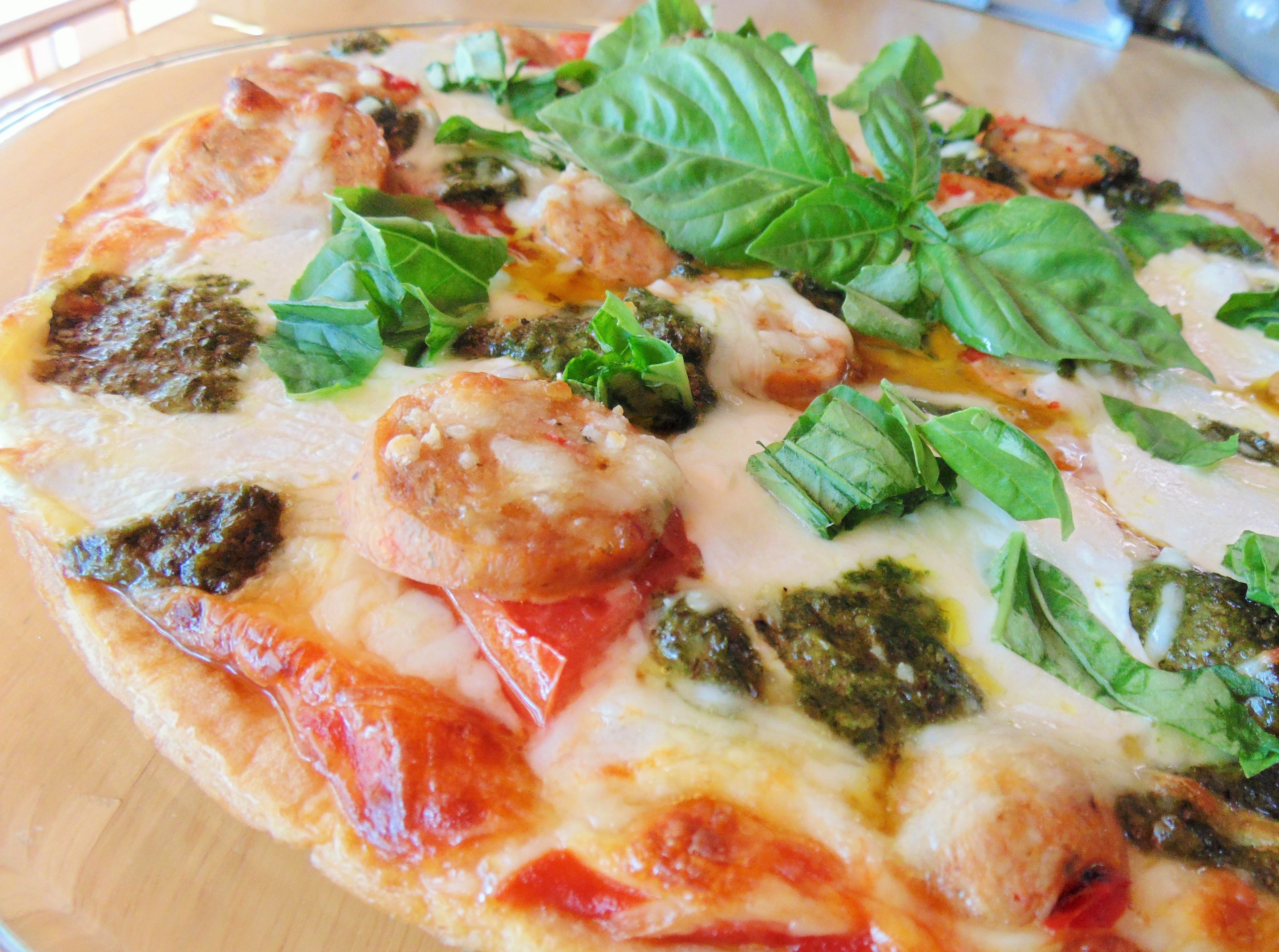 Margherita Pizza with Sausage and Pesto