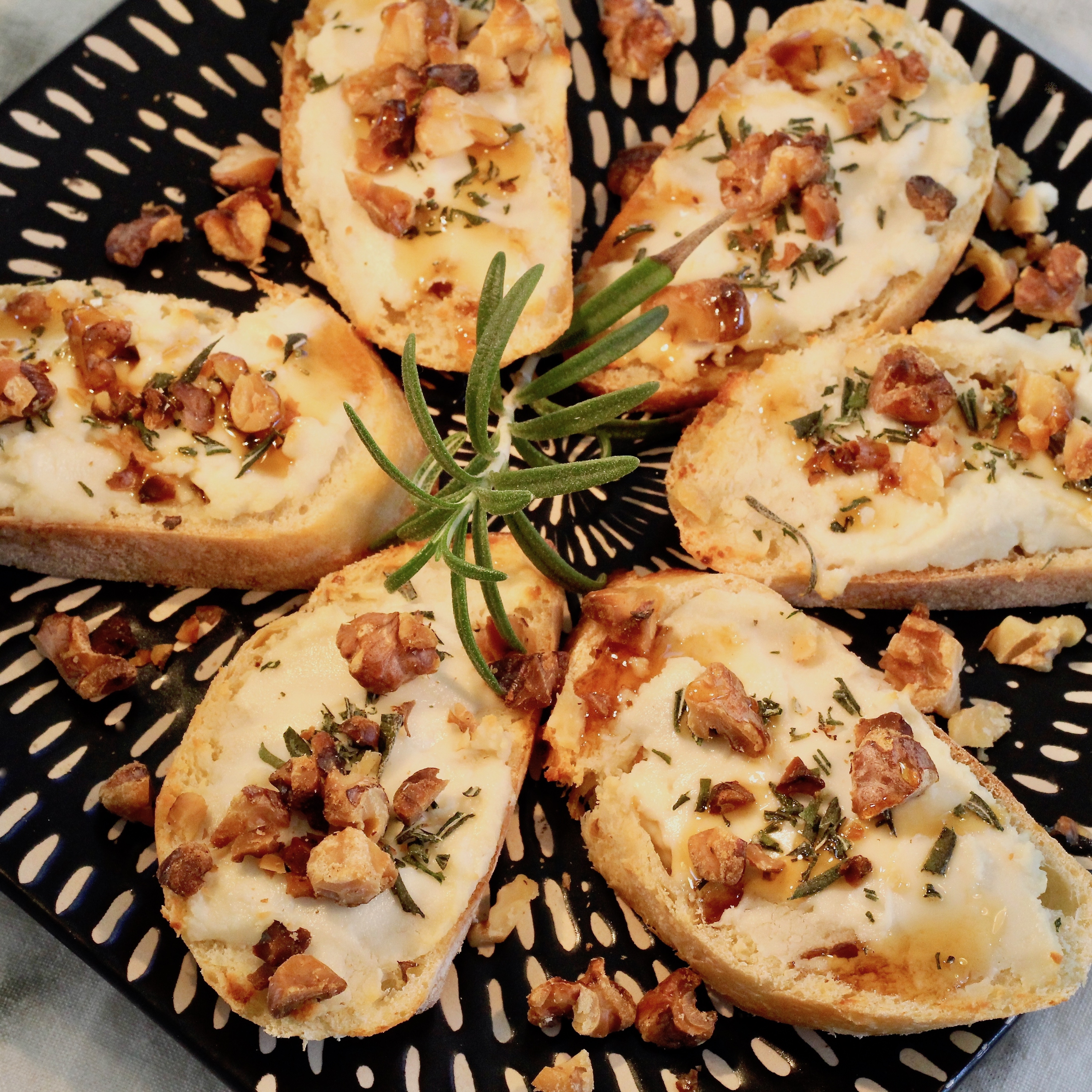 Rosemary and Goat Cheese Crostini with Walnuts and Honey