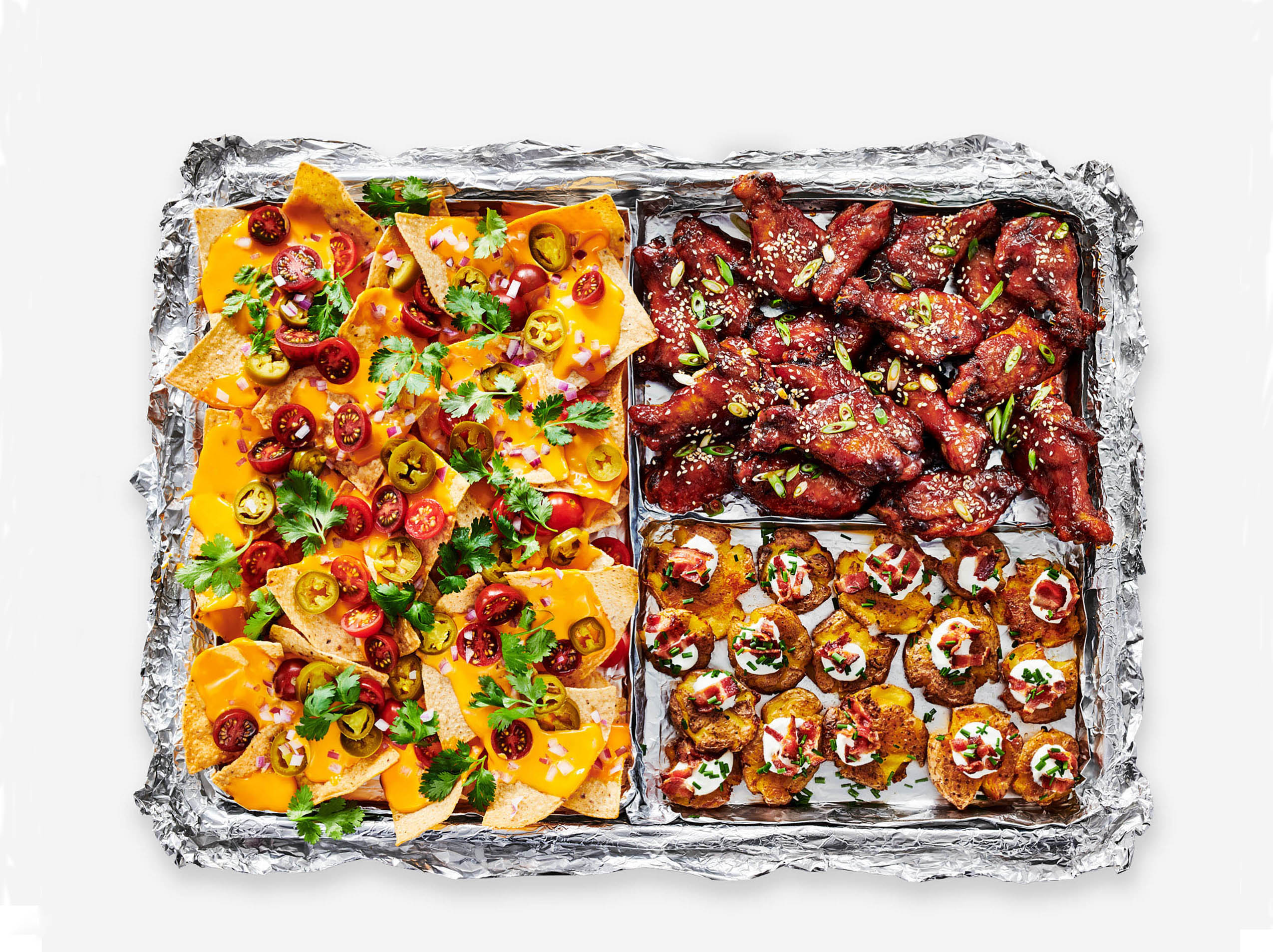 Sheet Pan Nachos, Sticky Sesame Ginger Wings, and Smashed Loaded Potatoes from Reynolds Wrap®